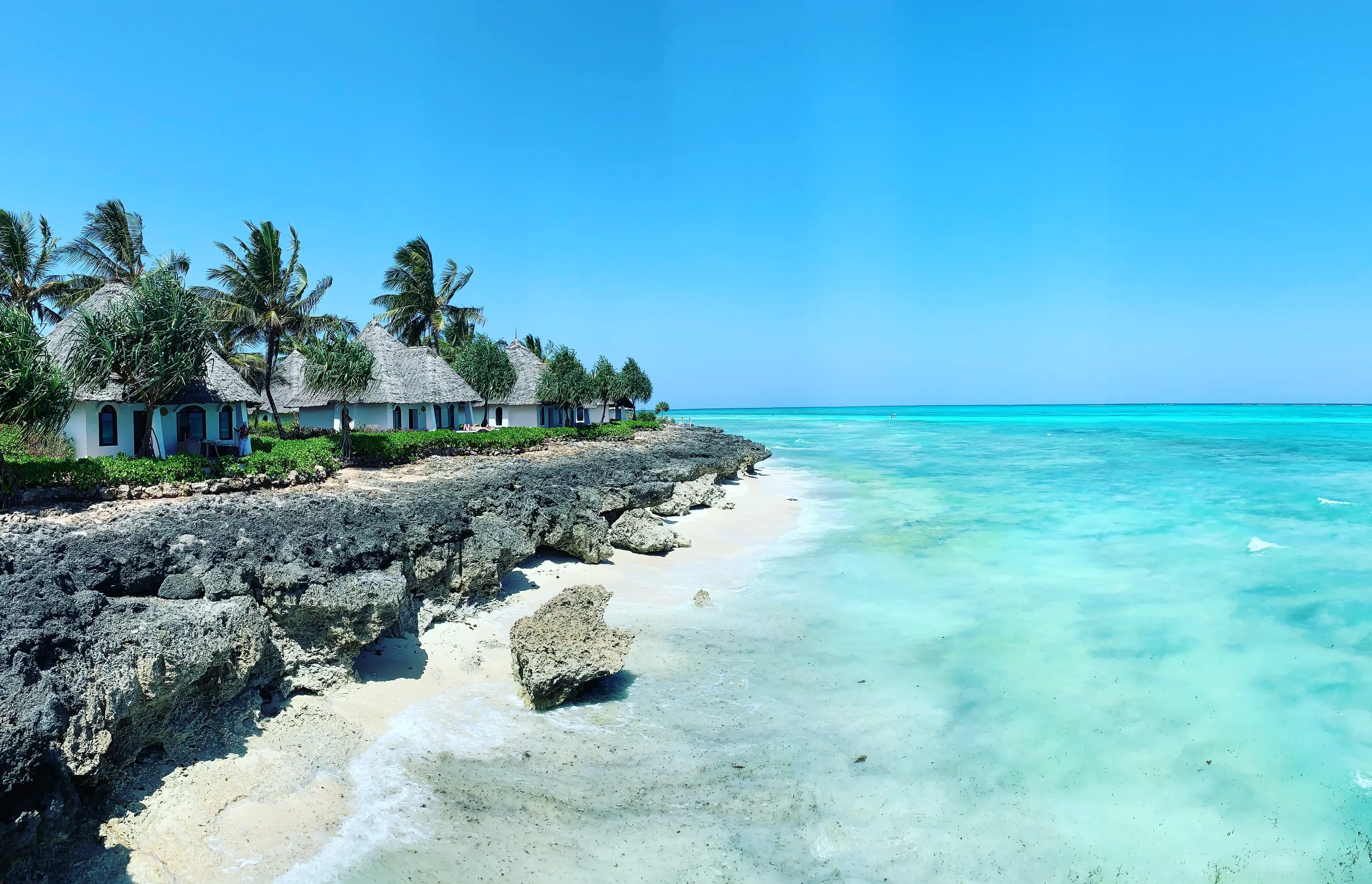 White-sand beach and turquoise water on Zanzibar